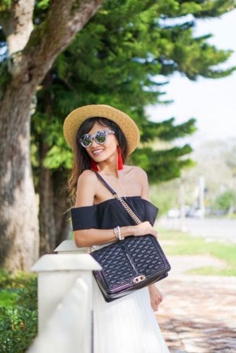 black rebecca minkoff jumbo love cross body, tassel earrings, boat hat, summer fashion