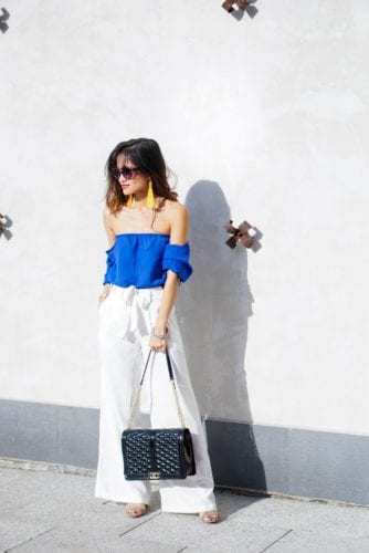 yellow tassel earrings, blue off the shoulder shirt, love cross body bag, white leg trouser pants, summer outfit, spring look, easter outfit