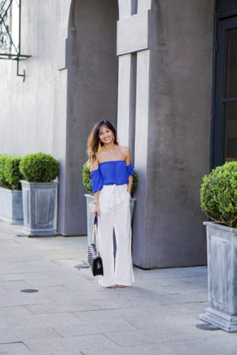 white pants, wide leg pants, trousers, off the shoulder top, its, yellow tassel earrings