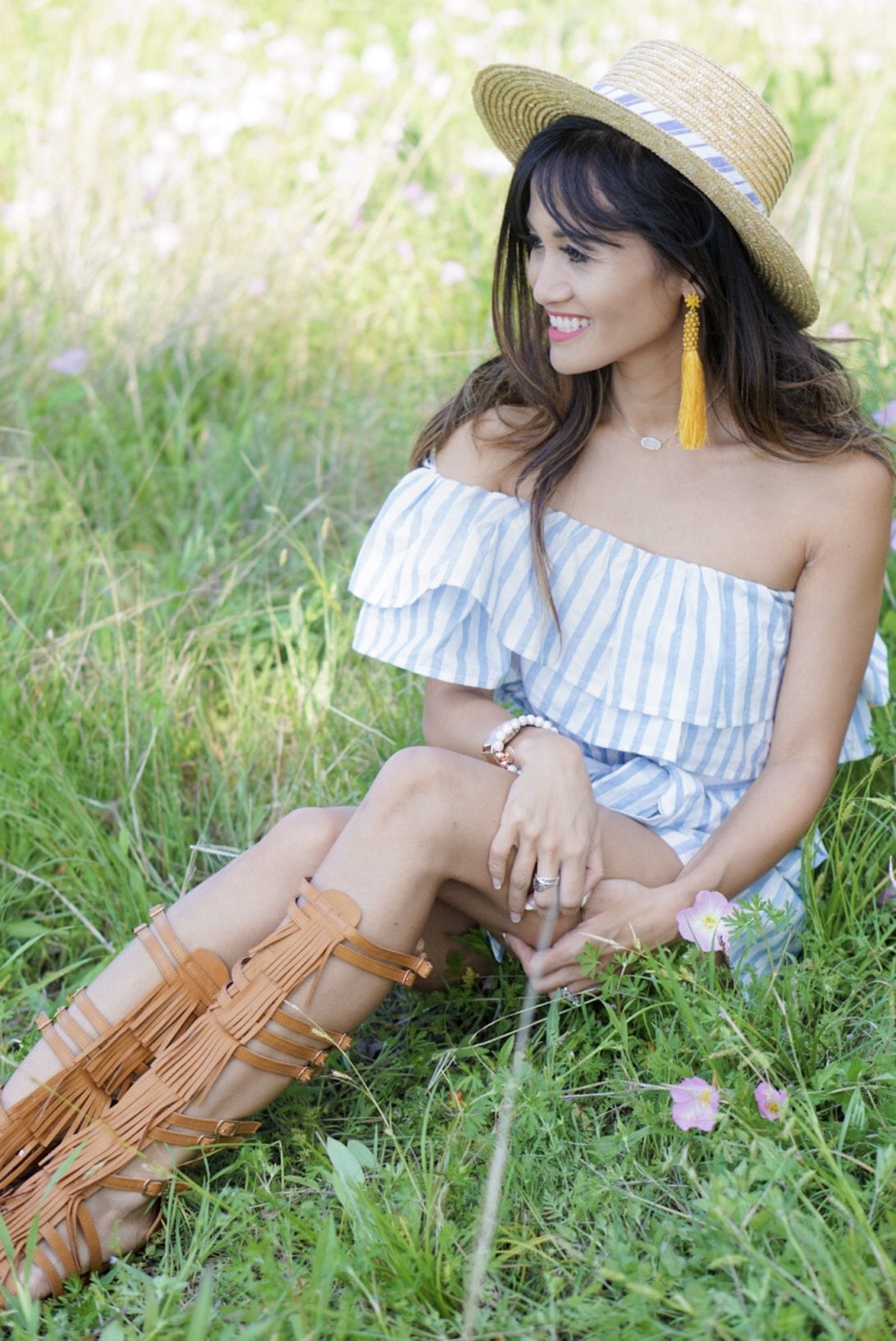 striped romper, fringe gladiator sandals, gladiator sandals, spring look, summer style. yellow tassel earrings