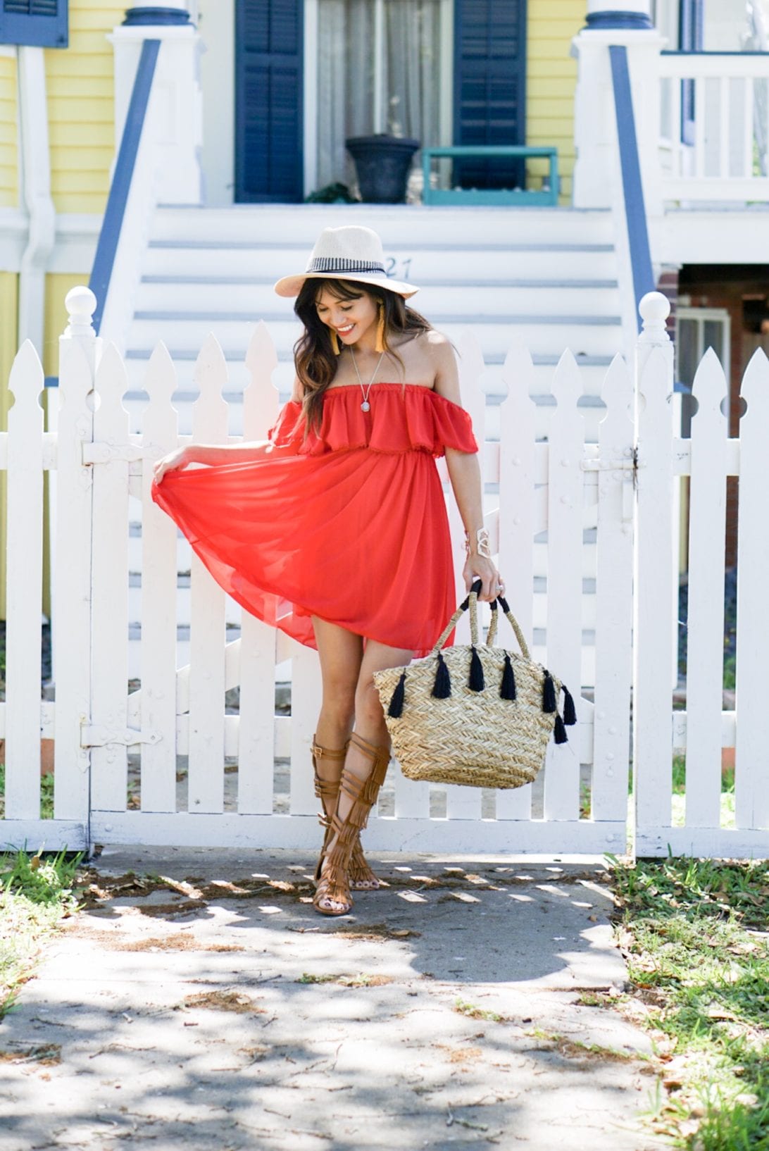 red dress, tire swing, galveston, beach style, summer style. off the shoulder, gladiators, tassel purse, tassel earrings