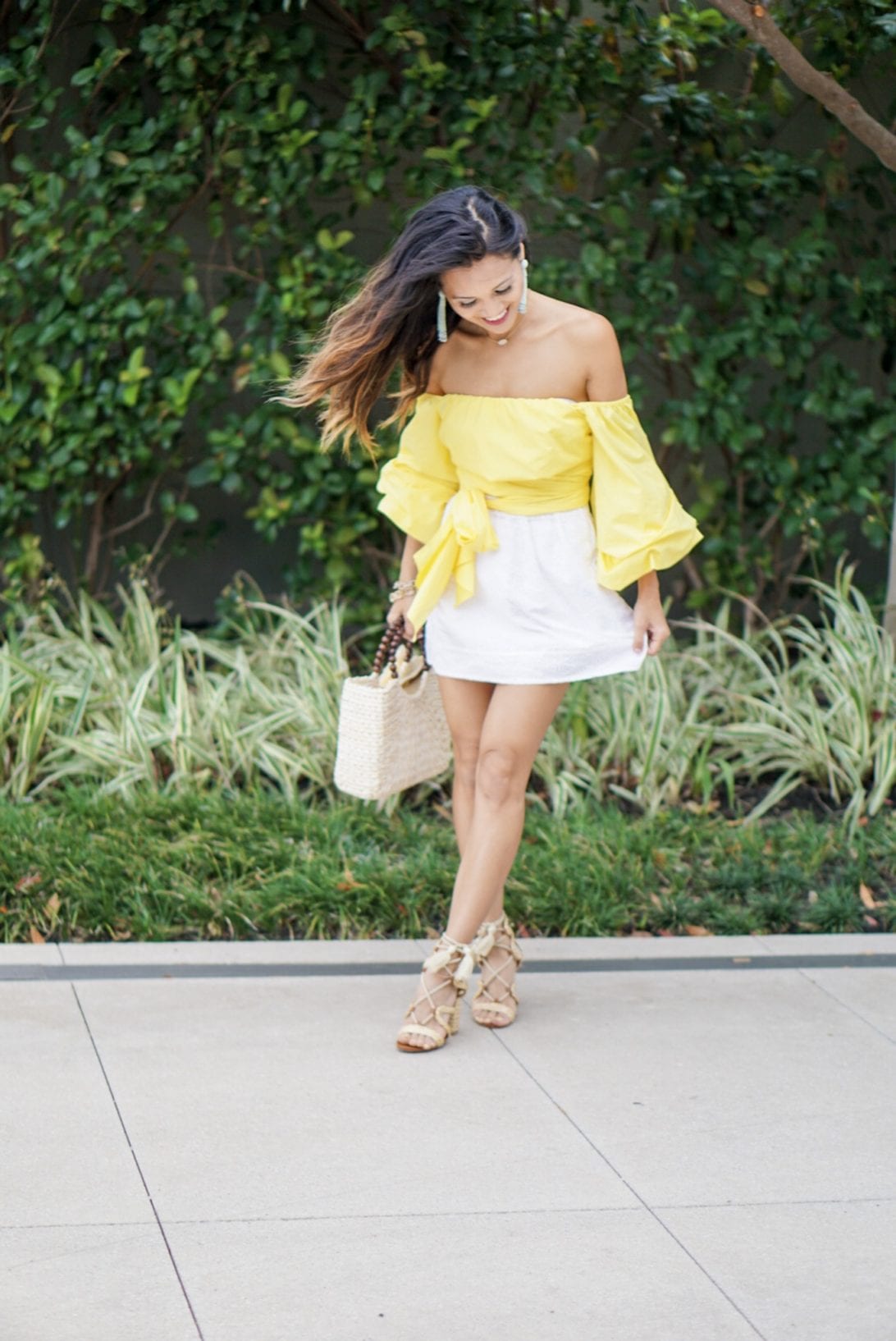 brunch outfit, white skirt, lace up heels, yellow wrap bow top, wrap blouse