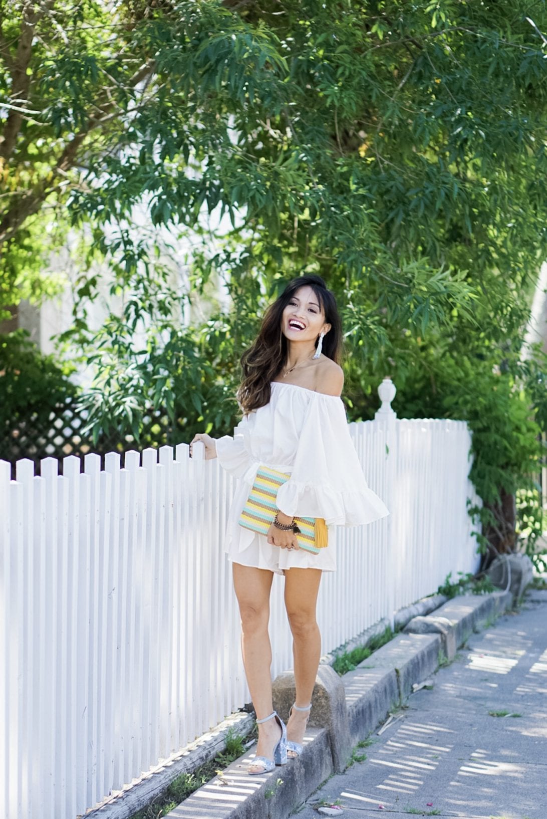 White Ruffle Romper by Houston fashion blogger Dawn P. Darnell, yellow straw clutch