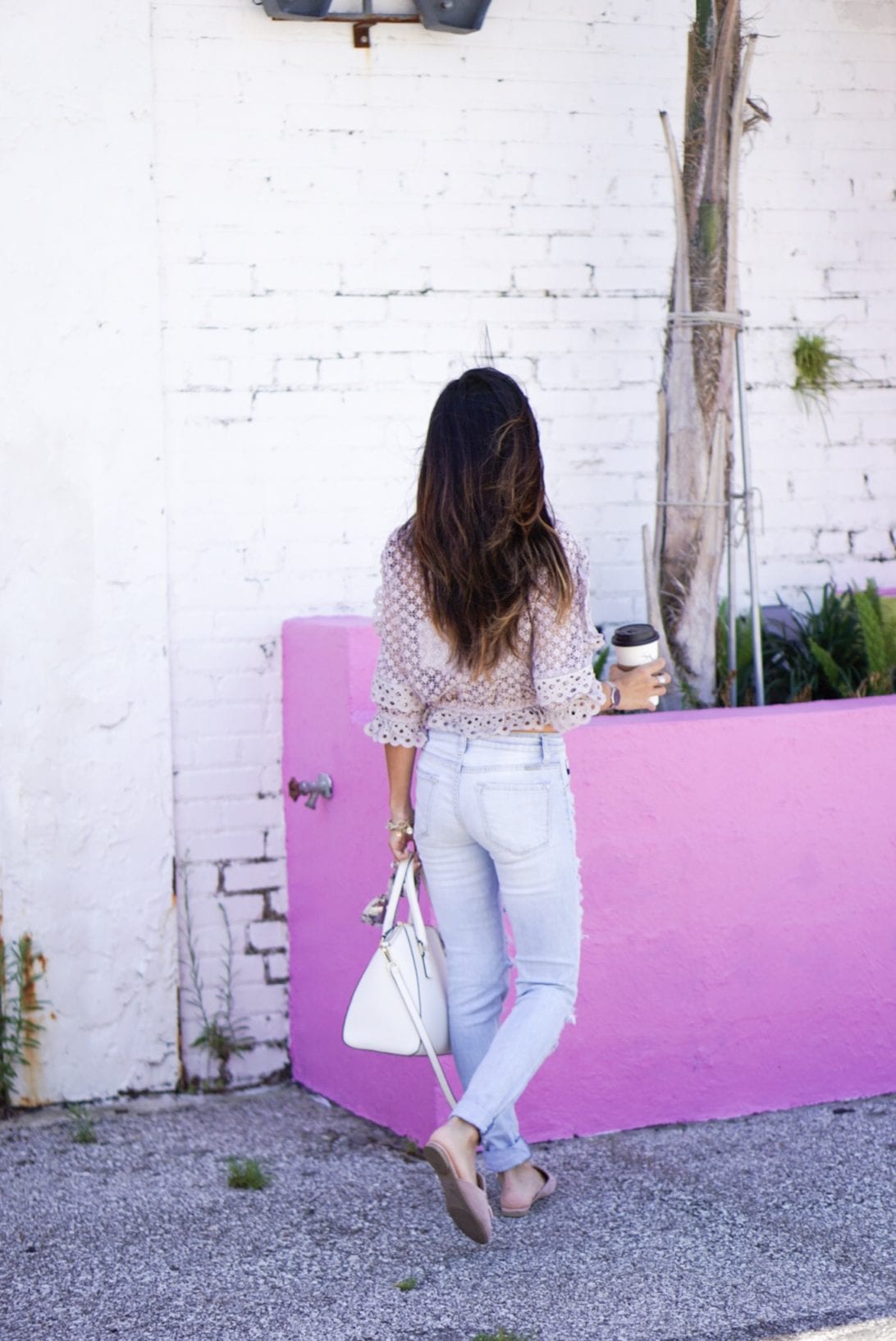 destructed denim, ripped jeans, tassel flats, tassel mules, eyelet top 