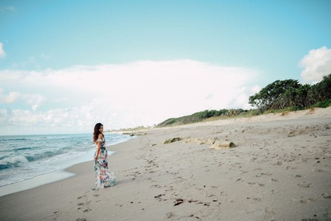 beach photoshoot, what to wear on the beach, what to wear at a photoshoot, ruffle maxi, floral maxi, beach style, summer dresses under $50, beach model, how to model, model poses, beach engagement shoots