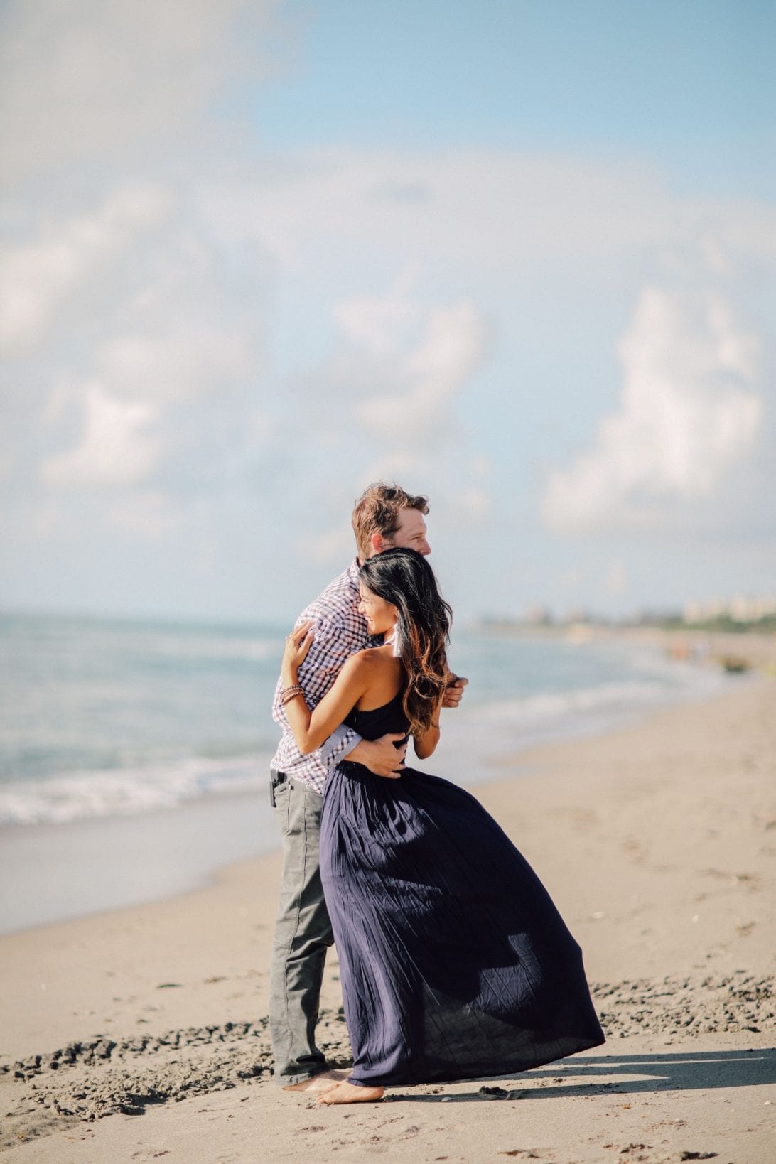 ENGAGEMENT PHOTOS, COUPLE PHOTOS. BEACH PHOTOSHOOT, BEACH ENGAGEMENT, BEACH ANNIVERSARY SHOOT, WHAT TO WEAR AT A PHOTO SHOOT, NAVY MAXI