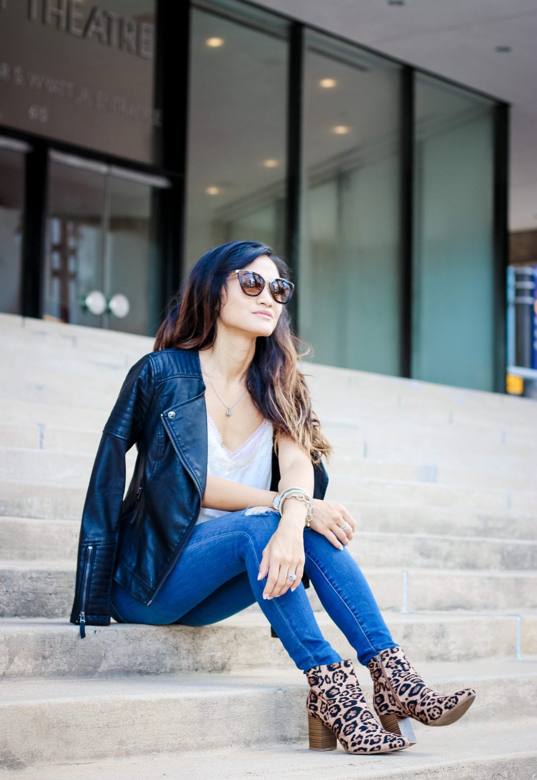what to wear after Labor Day, Labor Day outfit, leather moto jacket, black leather jacket, moto jacket, ripped jeans, leopard booties, Prada sunglasses, statement booties, fall outfit