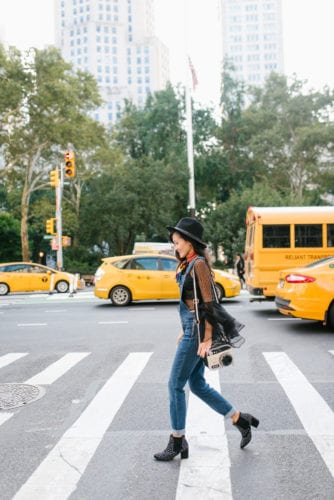 NYFW OUTFIT, NYFW STREET STYLE, New York FASHION WEEK, New York CITY, OUTFIT, STYLE, FALL OUTFIT, BLACK FEDORA, BELL SLEEVE TOP, HOW TO WEAR OVERALLS, DENIM OVERALLS, OVERALLS, FLATIRON, NYC, NYFW RECAP, STUDDED BOOTIES, #NYFW2017, HOW TO WEAR A SCARF