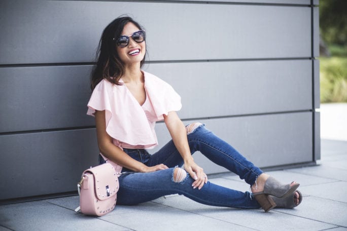 Prada sunglasses, pink frill top, chicwish, high waisted skinny jeans, wear pink, pink studded cross body bag, Susan G komen, race for the cure, breast cancer awareness 