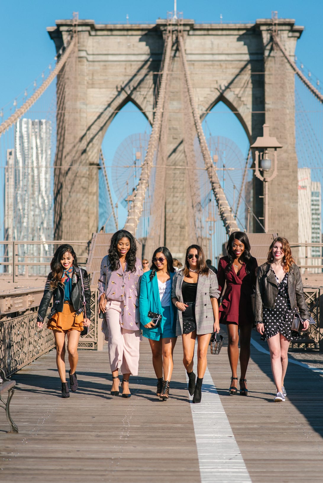 NYFW, NYFW OUTFIT, NYFW STREETSTYLE, New York FASHION WEEK, NYFW 2017, BROOKLYN BRIDGE, BROOKLYN BRIDGE PHOTO SHOOT, AGACI, SATIN SKIRT, RUFFLE TOP, BLACK STUDDED BOOTIES. SCARF, TIE SCARF, CAMERA BAG, BOSS BABES, GIRL GANG, BLOGGER BABES