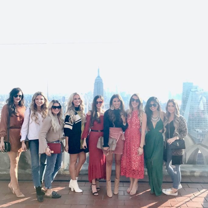 NYFW 2017, NYFW, New York FASHION WEEK, NYC travel guide, things to do in NYC, places to take pictures in NYC, top of the rock, Rockefeller center, pared sunglasses, green dress, FASHION BLOGGERS