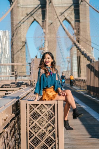 NYFW, NYFW OUTFIT, NYFW STREETSTYLE, New York FASHION WEEK, NYFW 2017, BROOKLYN BRIDGE, BROOKLYN BRIDGE PHOTO SHOOT, AGACI, SATIN SKIRT, RUFFLE TOP, BLACK STUDDED BOOTIES. SCARF, TIE SCARF