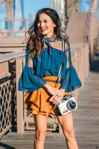 NYFW, NYFW OUTFIT, NYFW STREETSTYLE, New York FASHION WEEK, NYFW 2017, BROOKLYN BRIDGE, BROOKLYN BRIDGE PHOTO SHOOT, AGACI, SATIN SKIRT, RUFFLE TOP, BLACK STUDDED BOOTIES. SCARF, TIE SCARF, CAMERA BAG