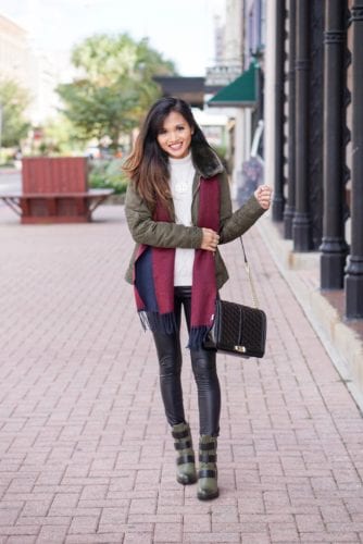 Sorel boots, holiday packing list, vacation packing list, winter packing list, faux leather pants, green puffer jacket