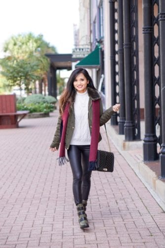 Sorel boots, holiday packing list, vacation packing list, winter packing list, faux leather pants, green puffer jacket