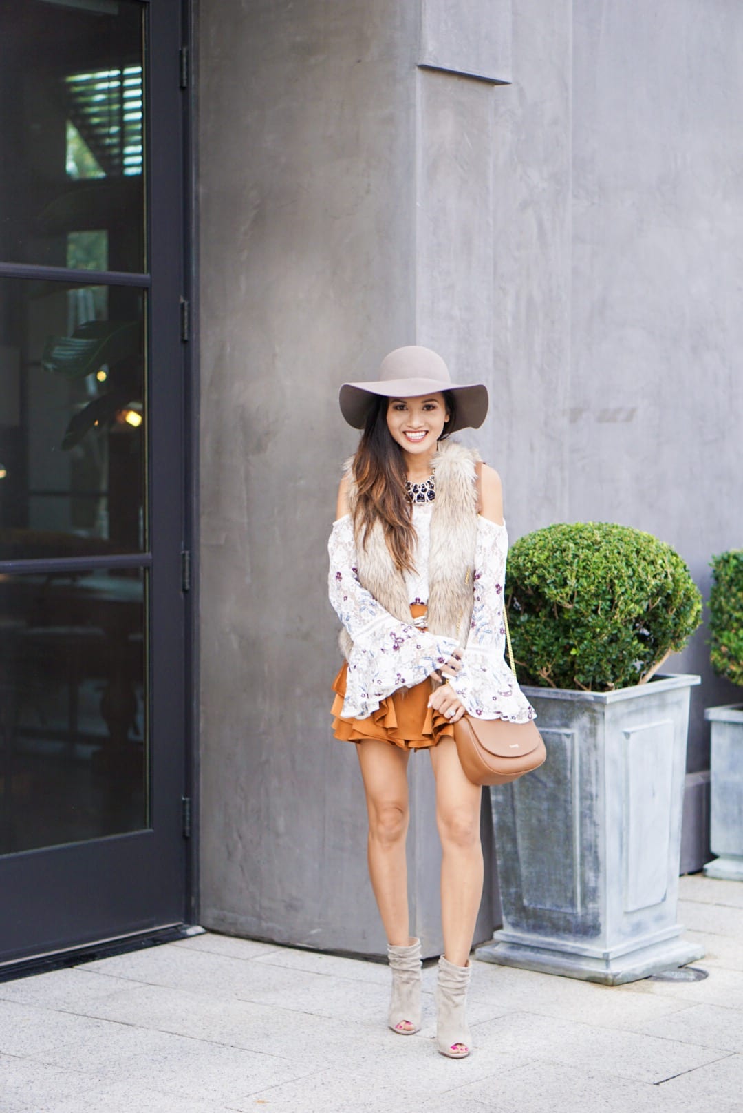 lipault bag, saddle bag, floppy hat, bell sleeve top, fall outfit, November outfit, satin skirt, fall look, open toe booties, statement necklace, lace top