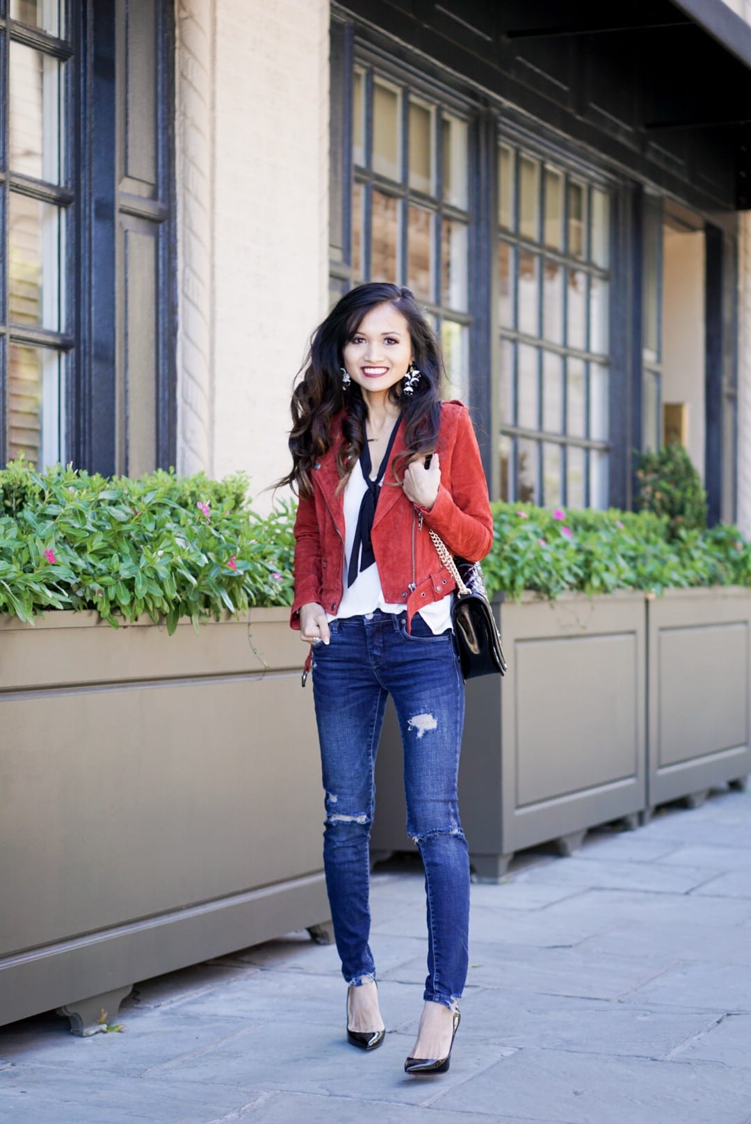 ZAPPOS, blank NYC, blank NYC denim, BLANK NYC MOTO JACKET, SUEDE JACKET, RED JACKET, HOLIDAY OUTFIT, CHRISTMAS OUTFIT, URBANATTITUDE, BAUBLE BAR STATEMENT EARRINGS, REBECCA MINKOFF CROSSBODY BAG, RED BOTTOMS, CHRISTIAN LOUBOUTIN HEELS, BLACK HEELS , 