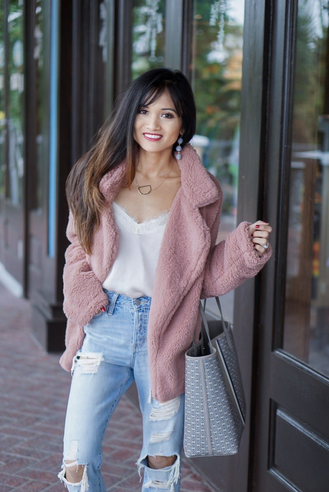 pink jacket, pink teddy bear coat, Tory Burch Gemini Link Tote, sherpa coat, ripped jeans, mom jeans, boyfriend jeans, dc canvas slip on shoes , initial necklace 