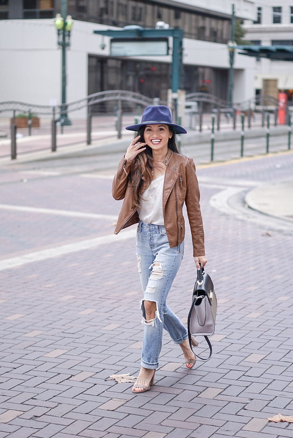 leather jacket, brown leather jacket, moto leather jacket, mom jeans, distressed jeans, navy felt hat, Steve Madden Carson sandal, white lace cami, Zac Zac Posen bag, spring outfit 