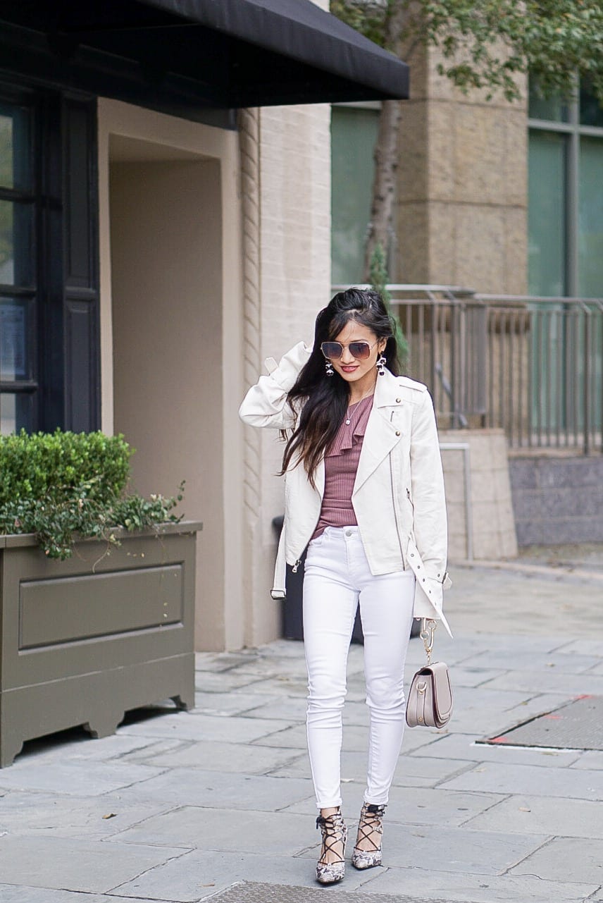Paige papyrus moto jacket, white on white, white jacket, white moto jacket, one shoulder ruffle top, quay sunglasses, bauble bar earrings, white denim, white denim outfit, winter to spring outfit, small chested outfit, tips for styling with small breast, lace up heels