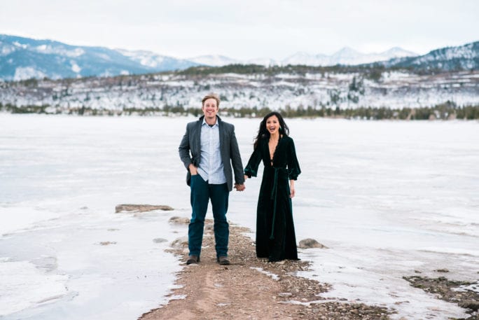 family pictures, snow family pictures, Colorado family pictures, frozen lake, christmas card family pictures, boy mom, green velvet dress, velvet dress, engagement pictures, couples pictures