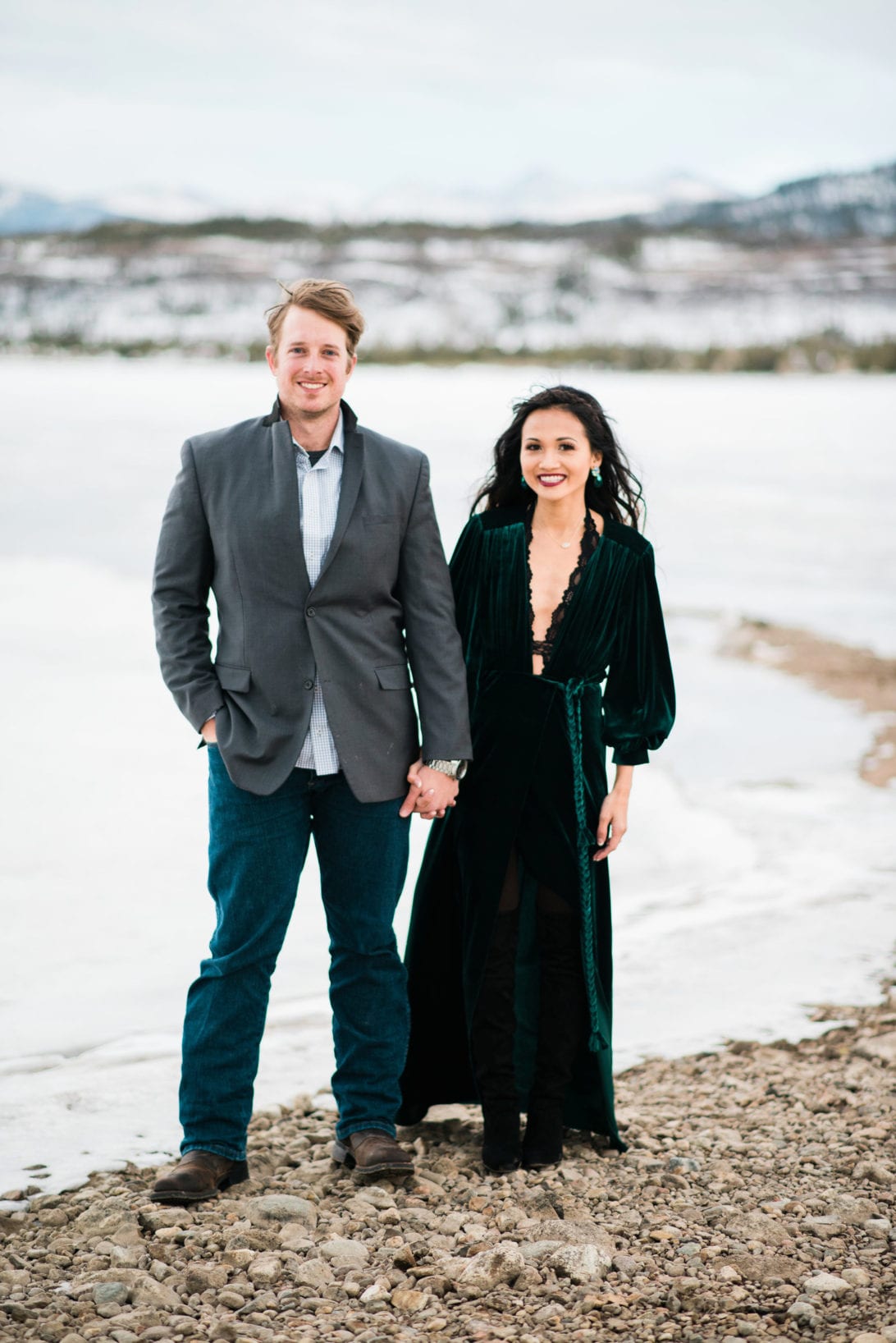 family pictures, snow family pictures, Colorado family pictures, frozen lake, christmas card family pictures, boy mom, green velvet dress, velvet dress, engagement pictures, couples pictures