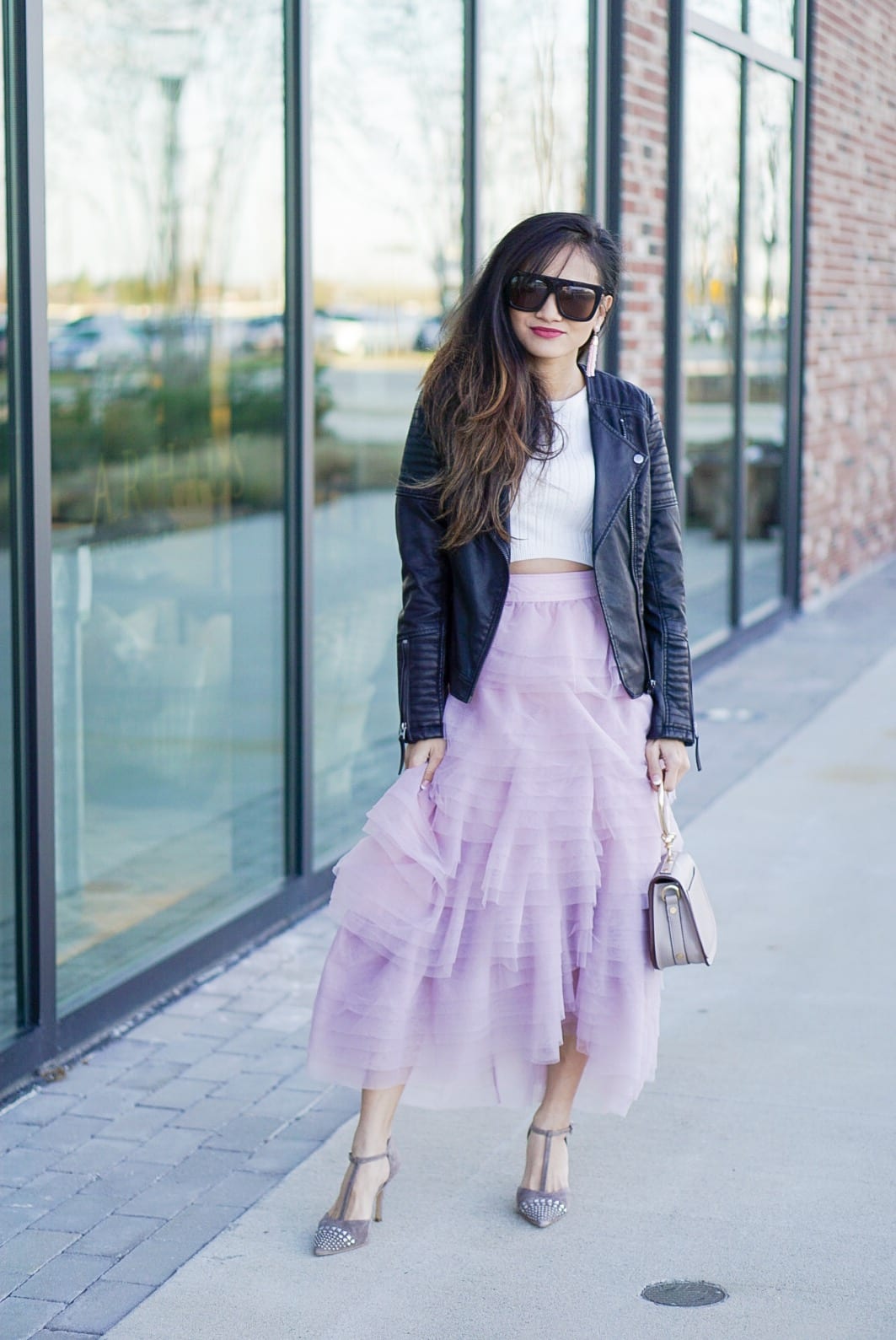 pink tulle skirt, toyshop moto jacket, black leather jacket, date night look, valentine's outfit, sex and the city style, Chloe bag, pink skirt, how to wear a tulle skirt, quay sunglasses, cafe racer