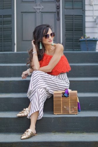 Jack by BB Dakota Lolita Top, striped pants, wide leg culottes, bamboo bag, quay sunglasses, one shoulder top, eyelet top, spring style, spring outfit, spring fashion, Rebecca Minkoff slides, Rebecca Minkoff Aden Slides, accessories for spring, tassel earrings