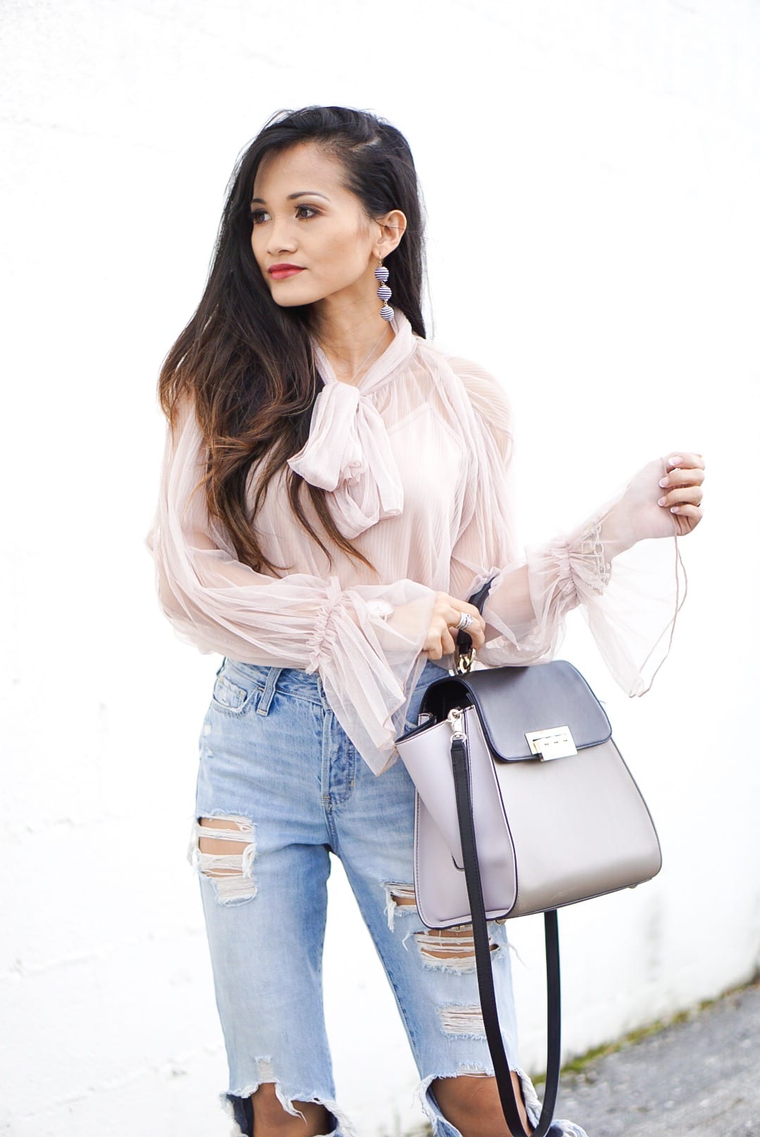 mesh bow top, ripped jeans, Zac Zac Posen bag, distressed jeans, Manolo blanik, nude heels, nude pumps 