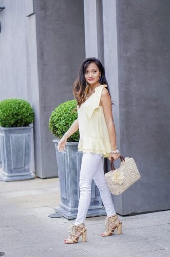 yellow tie sleeve top, peplum top, easter, easter outfit, spring style, spring fashion, straw bag, woven heels, wrap heels, pastel yellow, white jeans