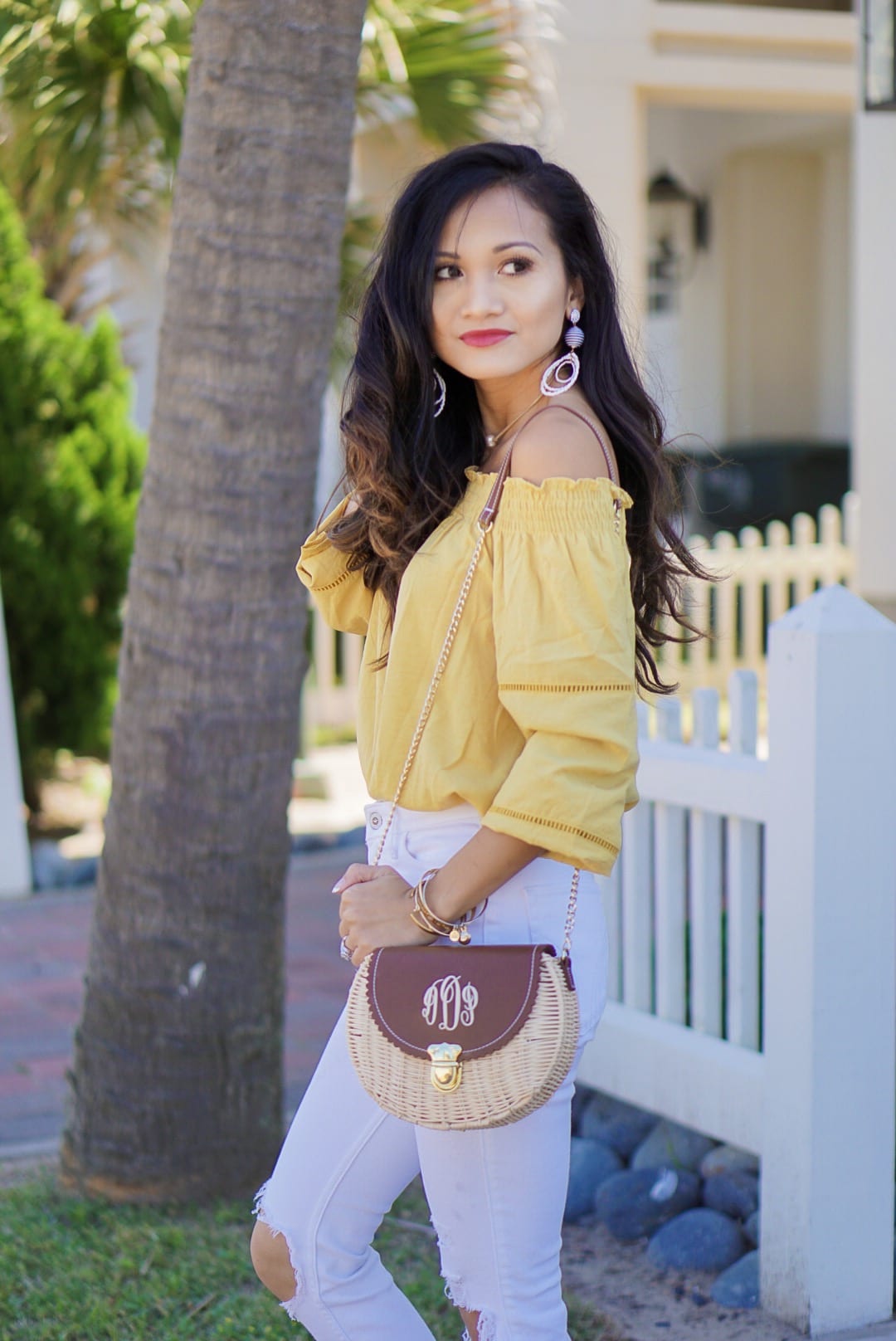 off the shoulder, cinco de Mayo, red embroidered dress, yellow statement earrings, bamboo bag, straw bag, yellow off the shoulder top, Betsy Boo's Boutique, red gingham top, Soludos platform sandals