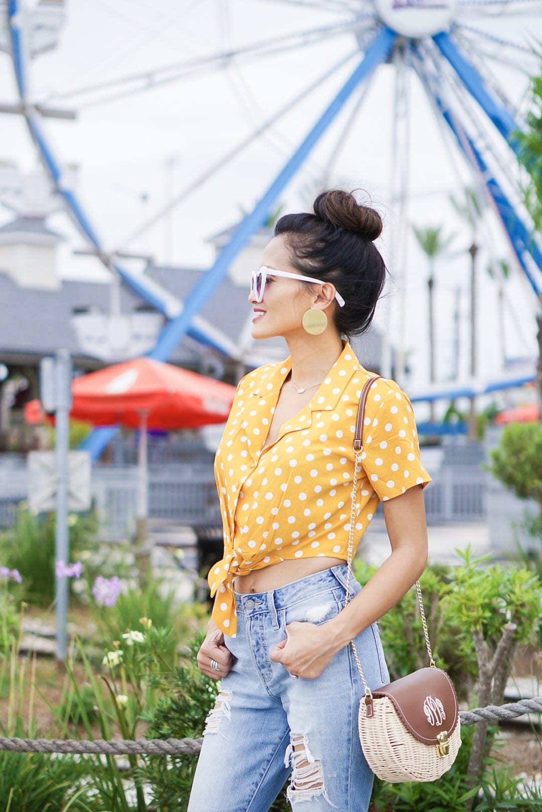 , polka dot, polka dot blouse, polka dot top, yellow polka dot, summer style #summerfashion, heart shaped glasses, monogrammed bag, straw bag, woven sandals, 60's inspired fashion, affordable fashion, mom jeans