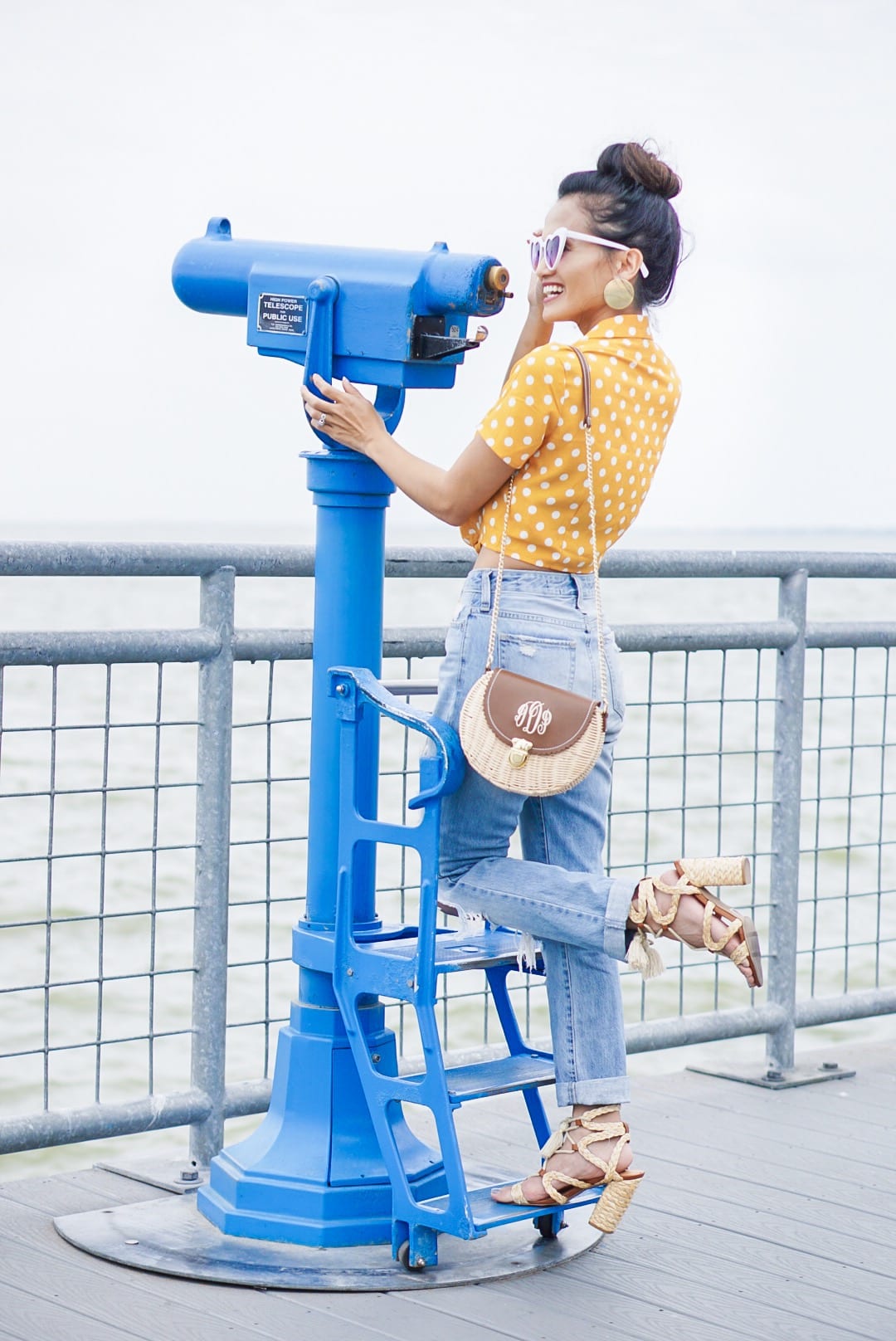 , polka dot, polka dot blouse, polka dot top, yellow polka dot, summer style #summerfashion, heart shaped glasses, monogrammed bag, straw bag, woven sandals, 60's inspired fashion, affordable fashion, mom jeans