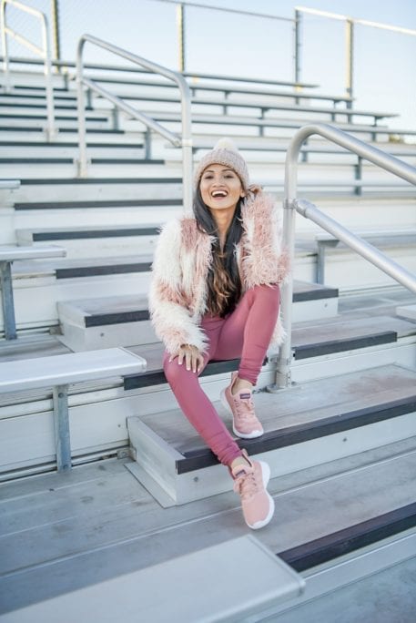 pink fur coat, pink sneakers, pink leggings, pink sports bra 