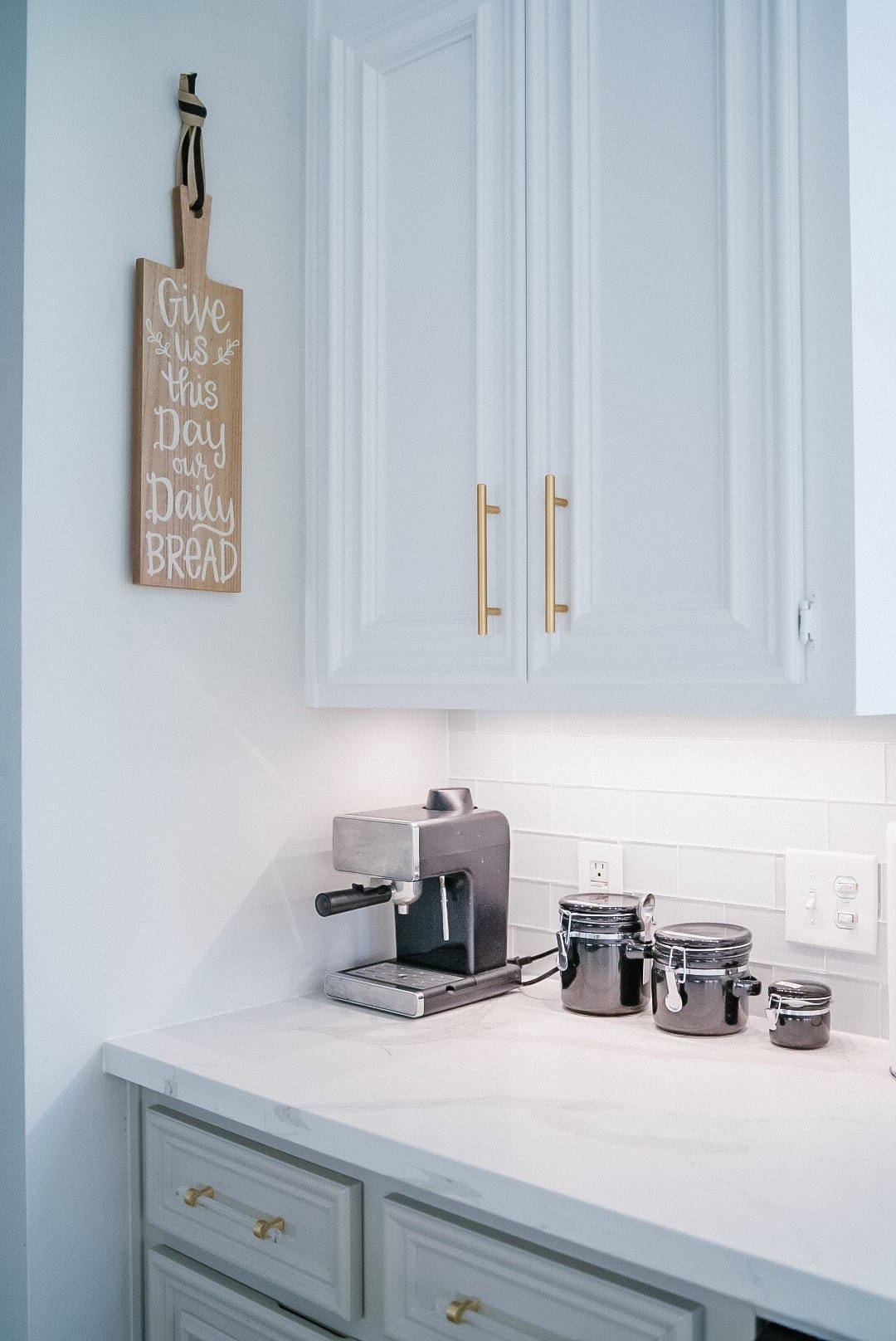 subway tiles, coffee station, give us our daily bread sign 