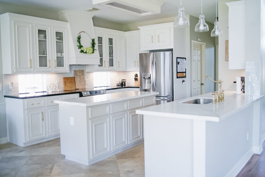 quartz countertops, white kitchen, grey cabinets, black countertops