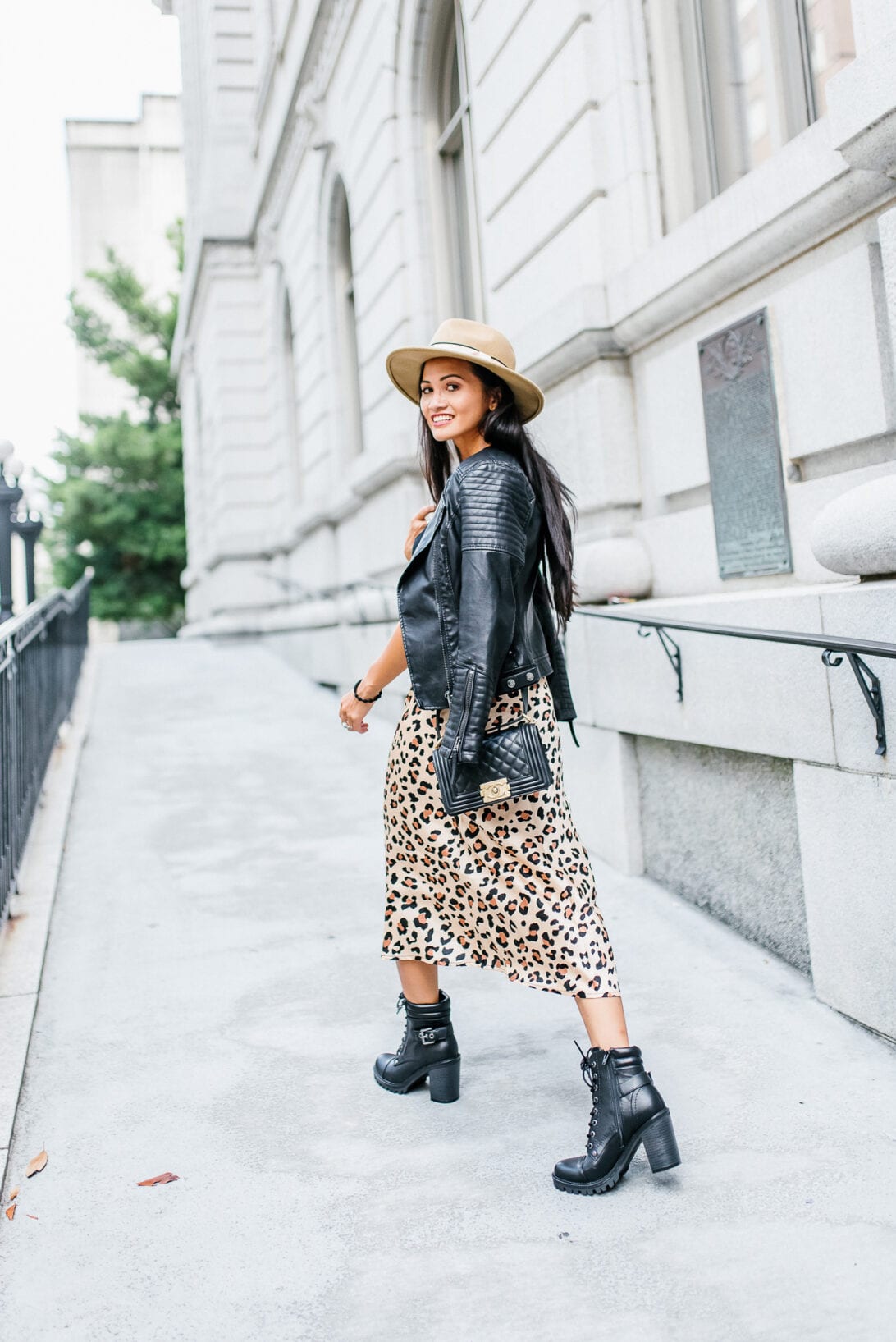 SMALL BLACK CHANEL BAG, MOTO JACKET, BLACK BOOTS