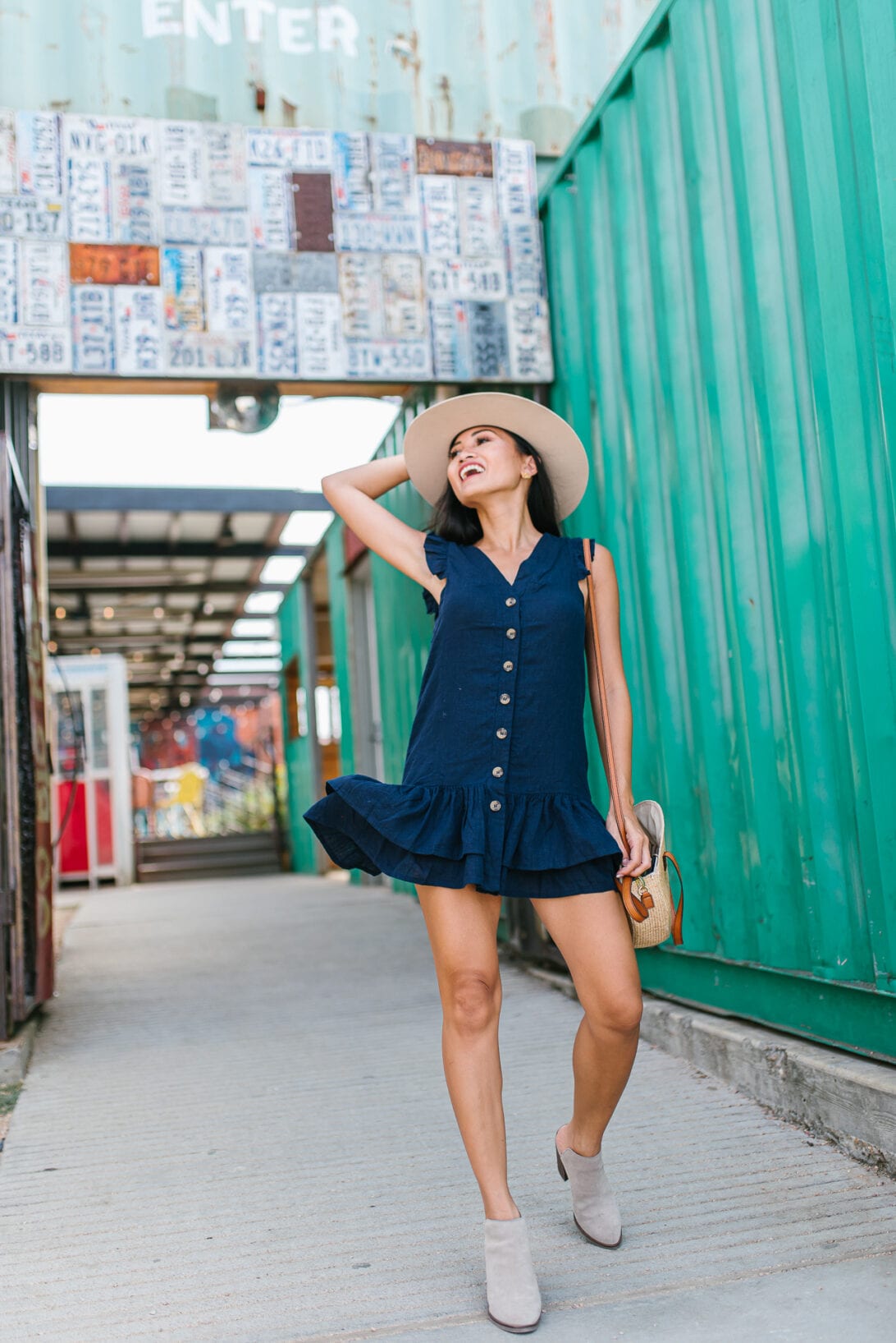 navy dress, fedora, mule boots