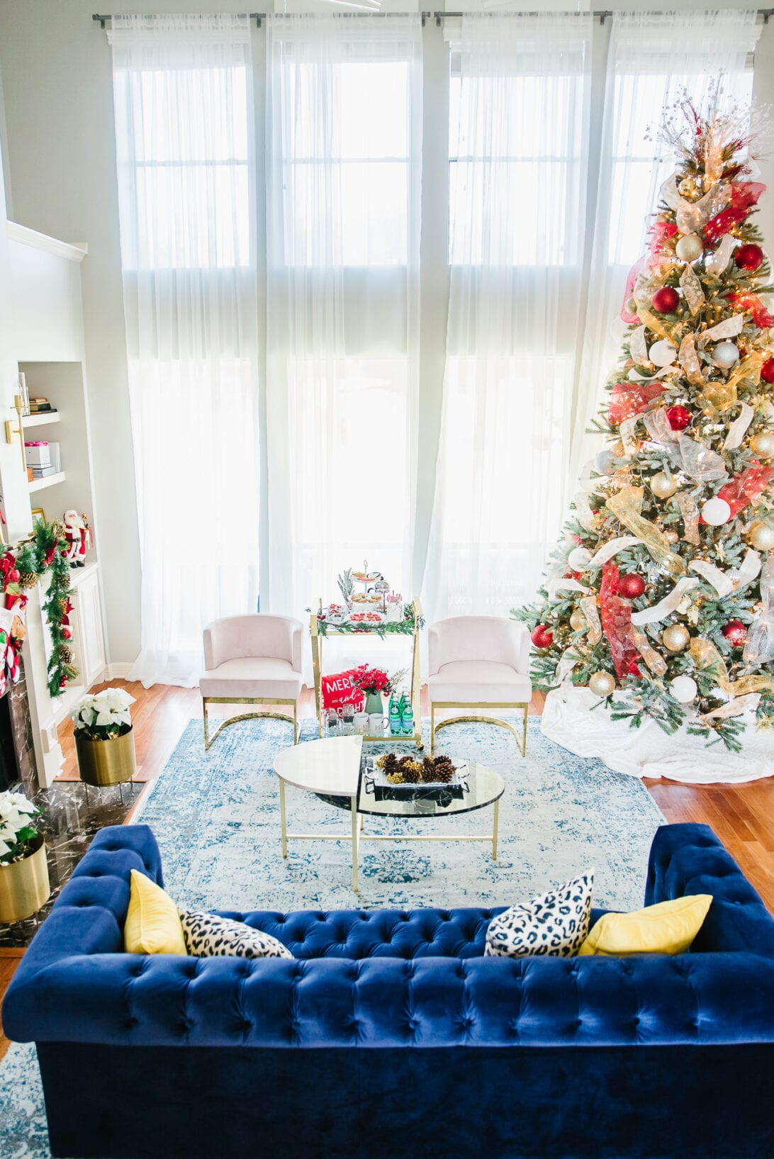 christmas living room decor, blue couch, glam style living room 