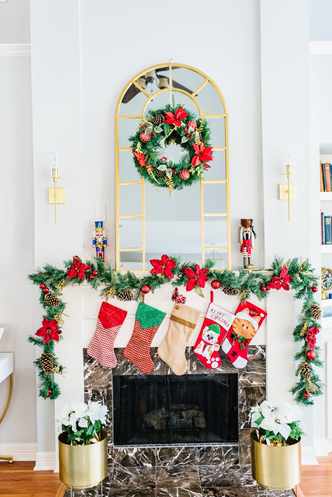 living room fireplace, Christmas fireplace decoration, Nutcrackers, poinsettias