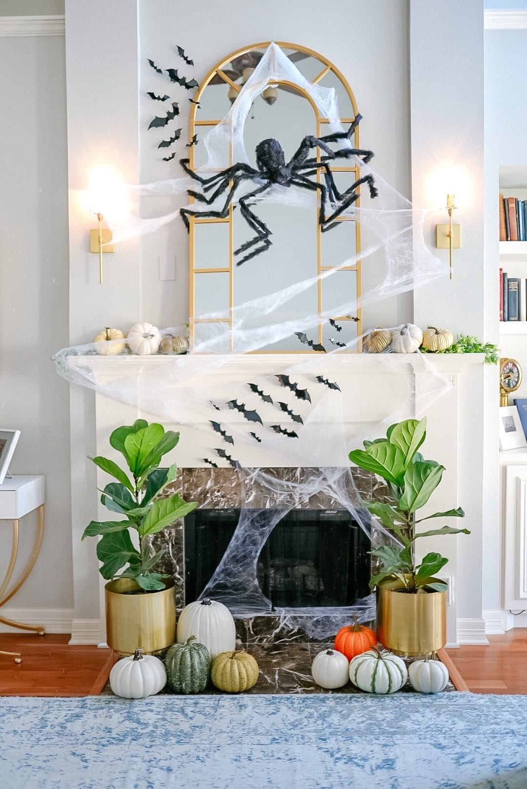 halloween home decoration , halloween fireplace decor, halloween bats, spider, Halloween living room, fig trees, fireplace mirror 