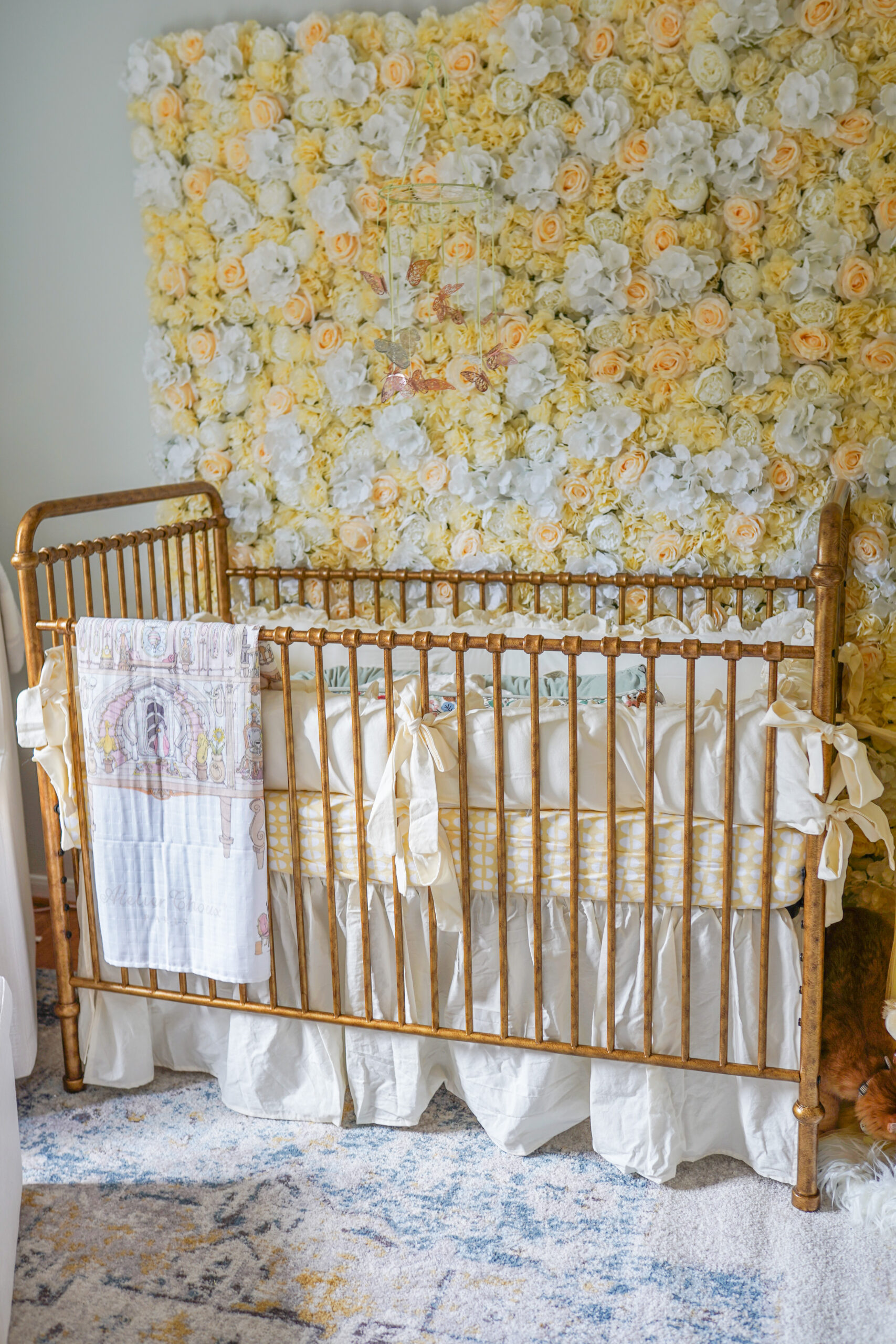 yellow nursery, metal crib, flower wall, French nursery, girl nursery, nursery decor 