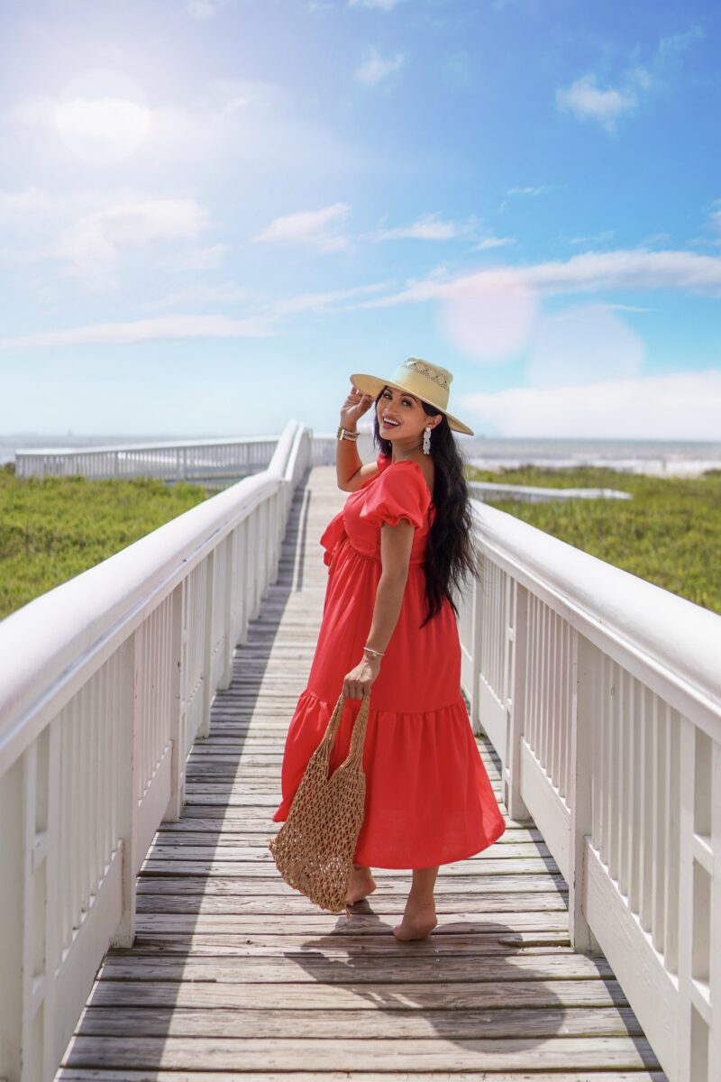 red dress, Memorial Day outfit, straw hat, woven bag, pregnancy style, summer pregnancy outfit, bump style, mom earrings 