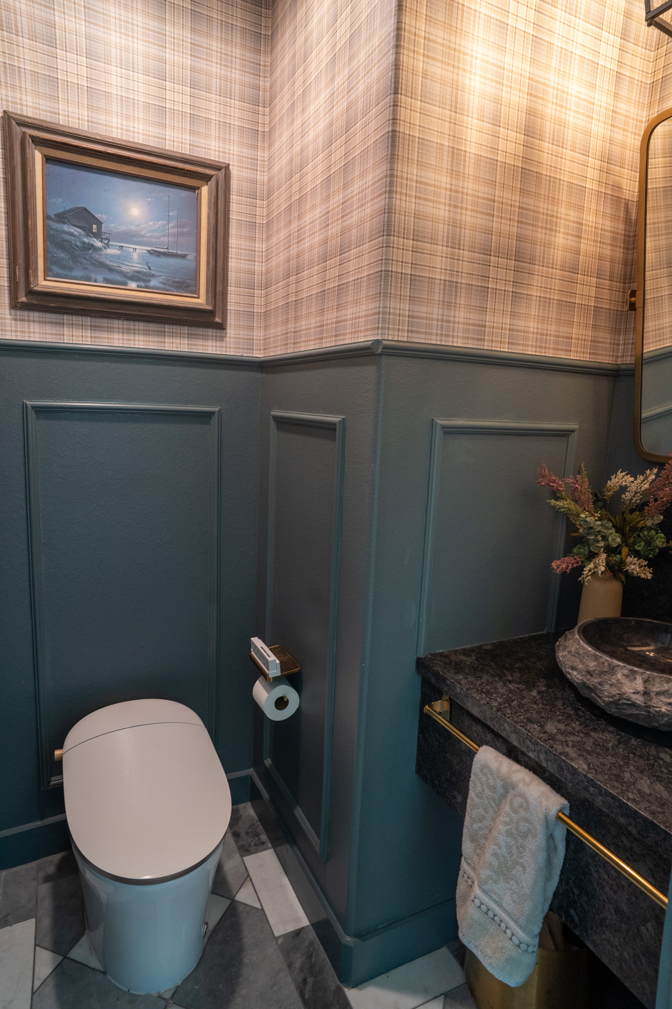 vessel sink, dark blue wall color, black sink, plaid wallpaper, black granite sink, bidet