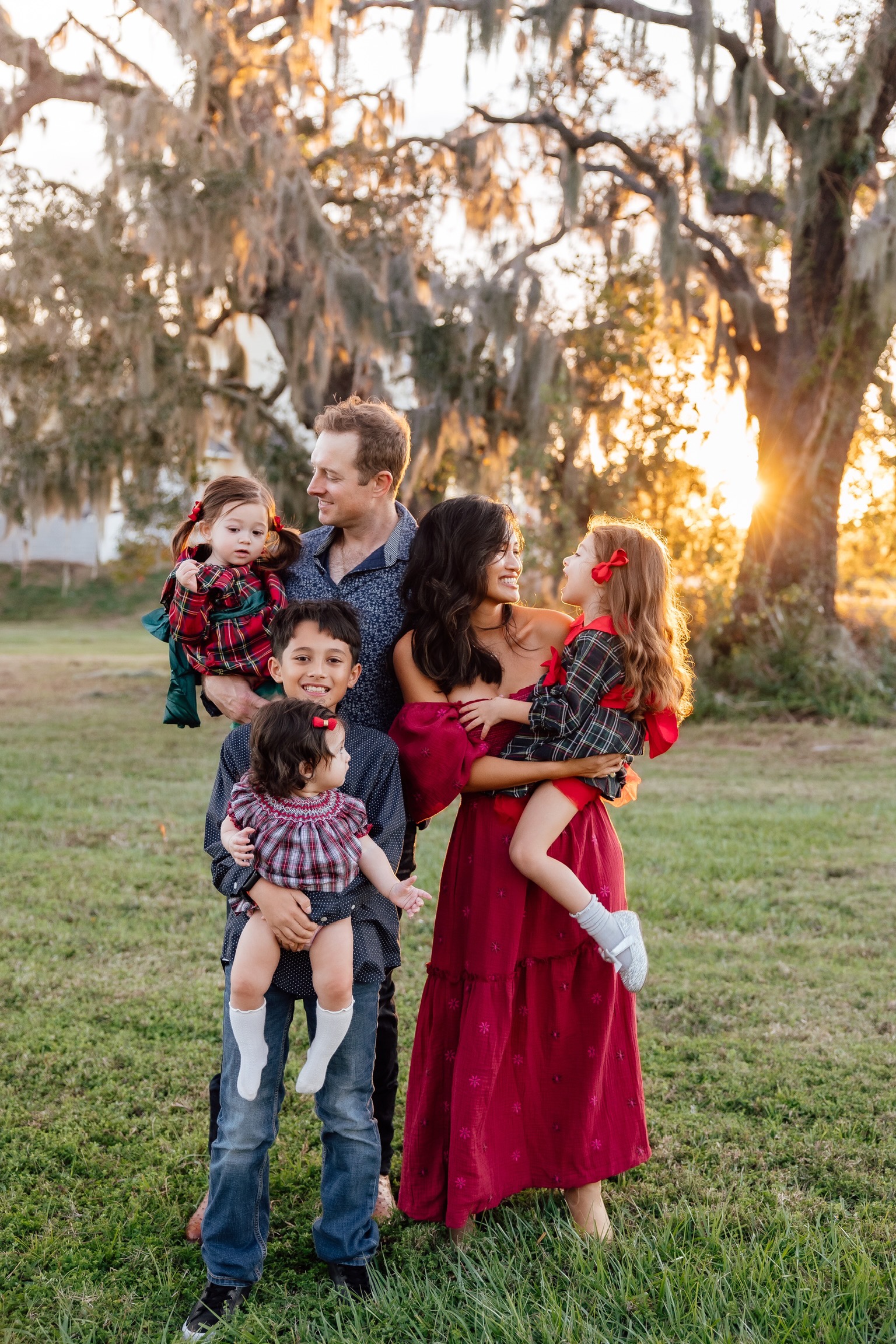 family outdoor photoshoot, Christmas photos, red dress, Christmas family outfits